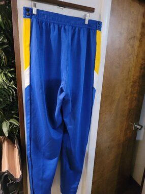 NIKE SPORT DOUBLE PAIR OF PANTS.